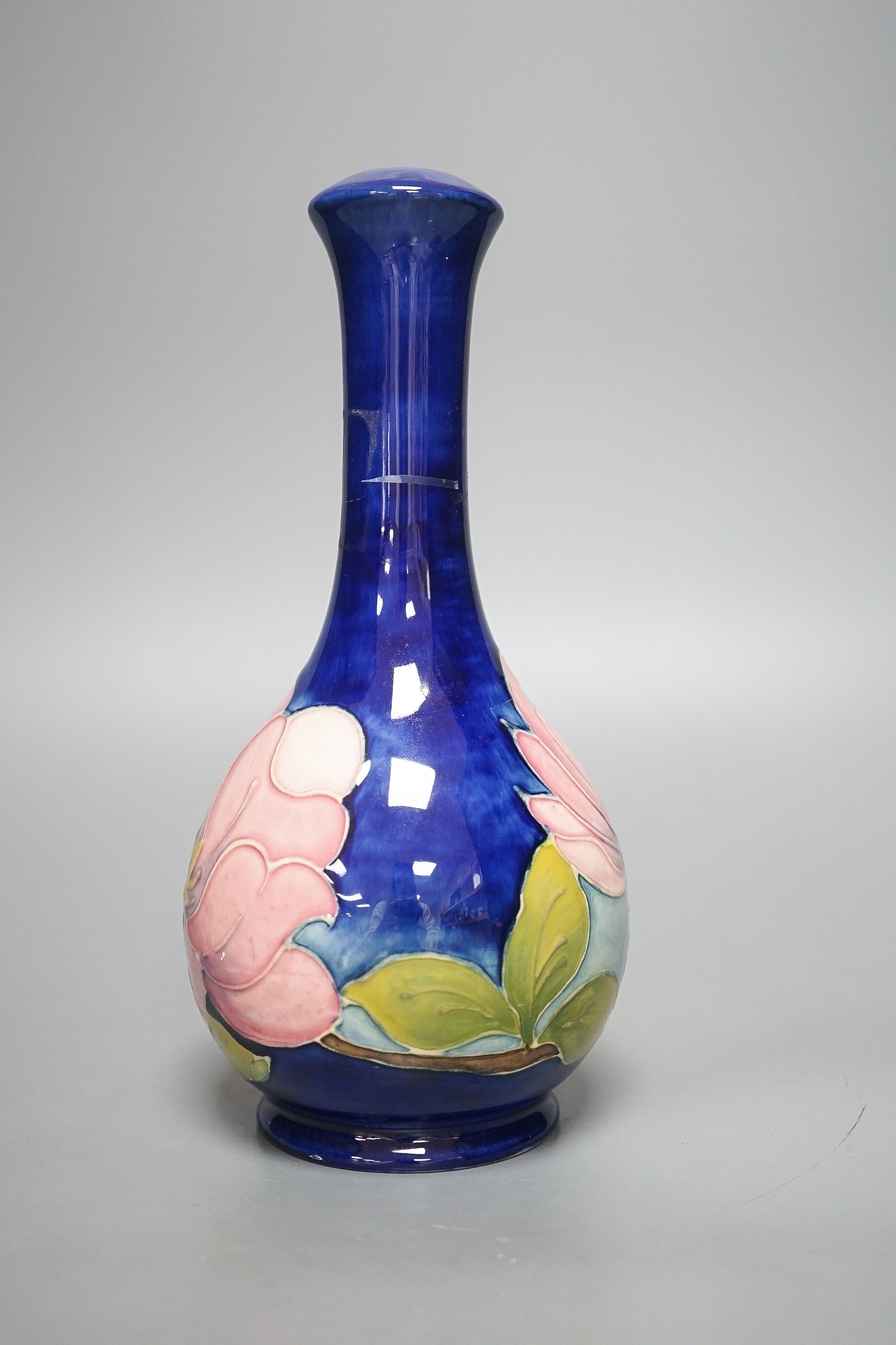 A Moorcroft magnolia pattern bottle vase 22.5cm